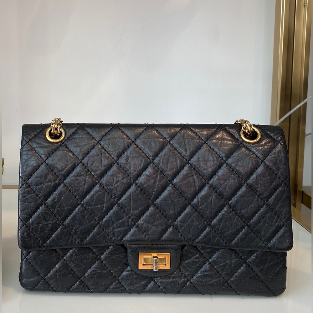 Chanel 2.55 handbag black gold